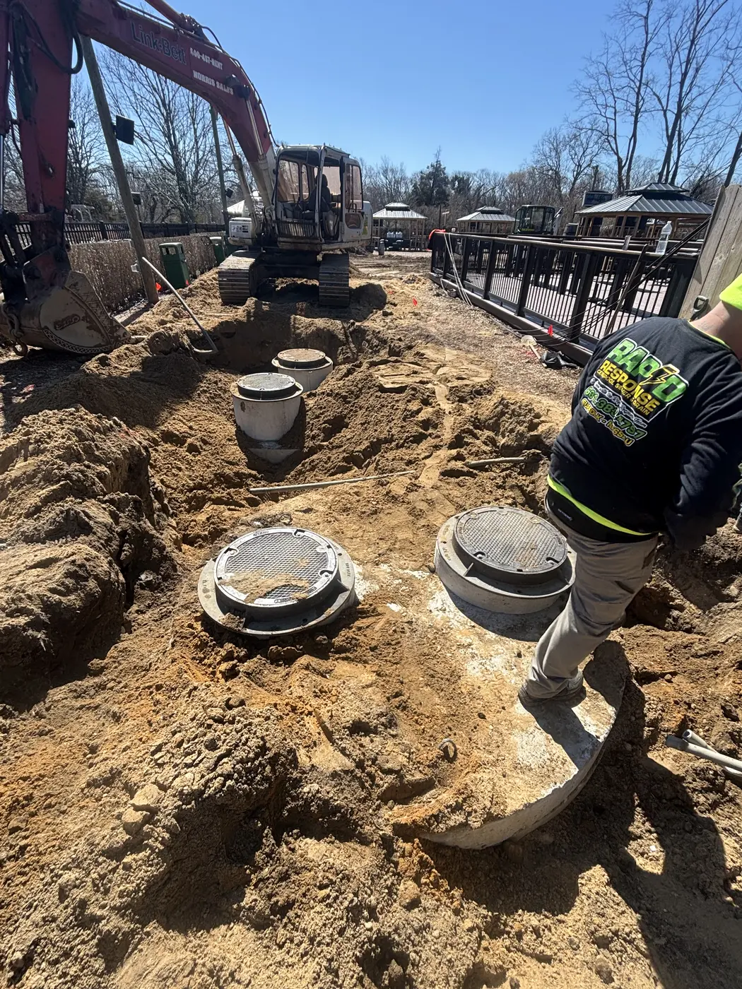 Rapid Response worker at cesspool installation job — Long Island, NY
