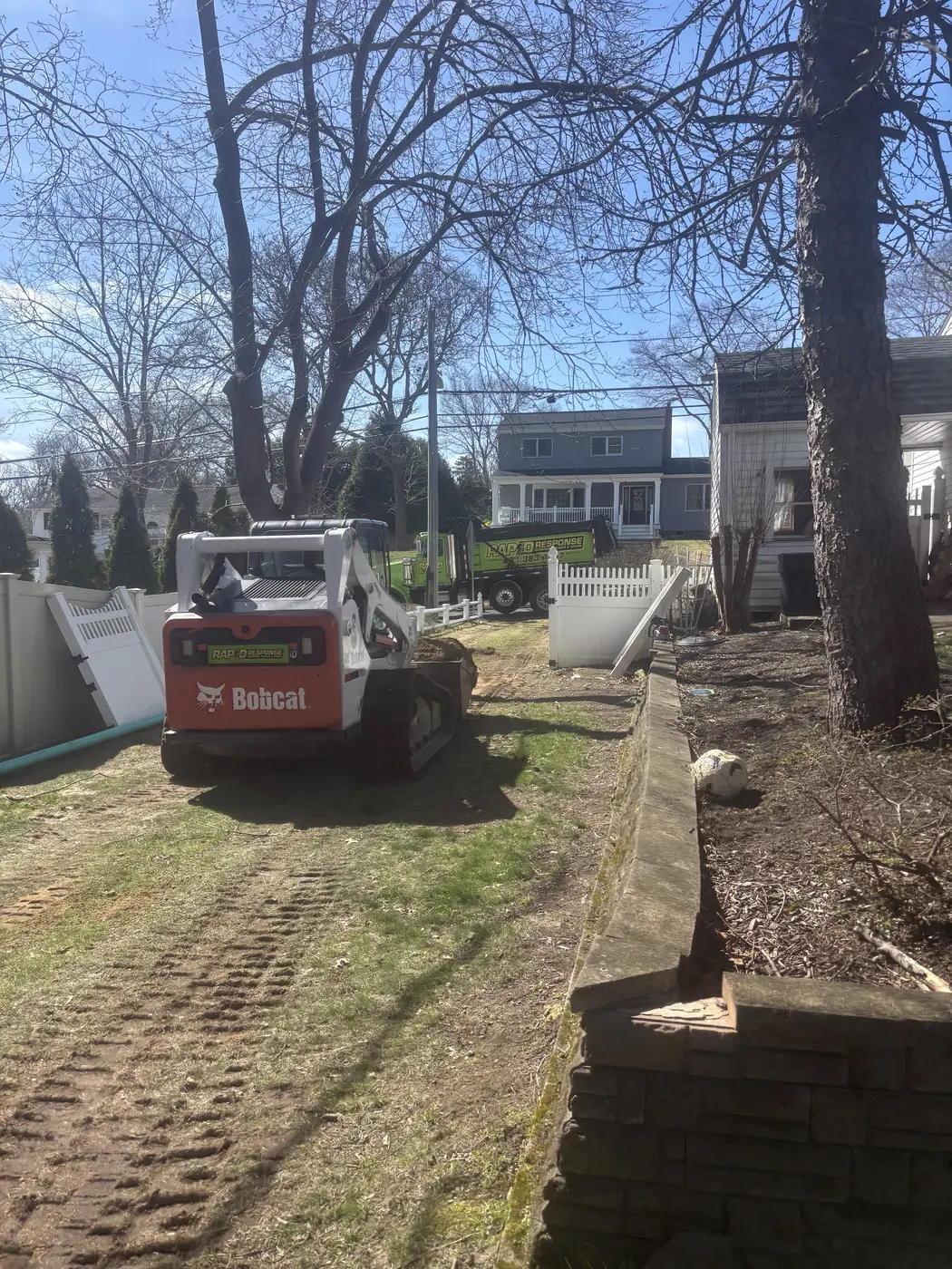 Rapid Response Bobcat at residential cesspool job — Long Island, NY