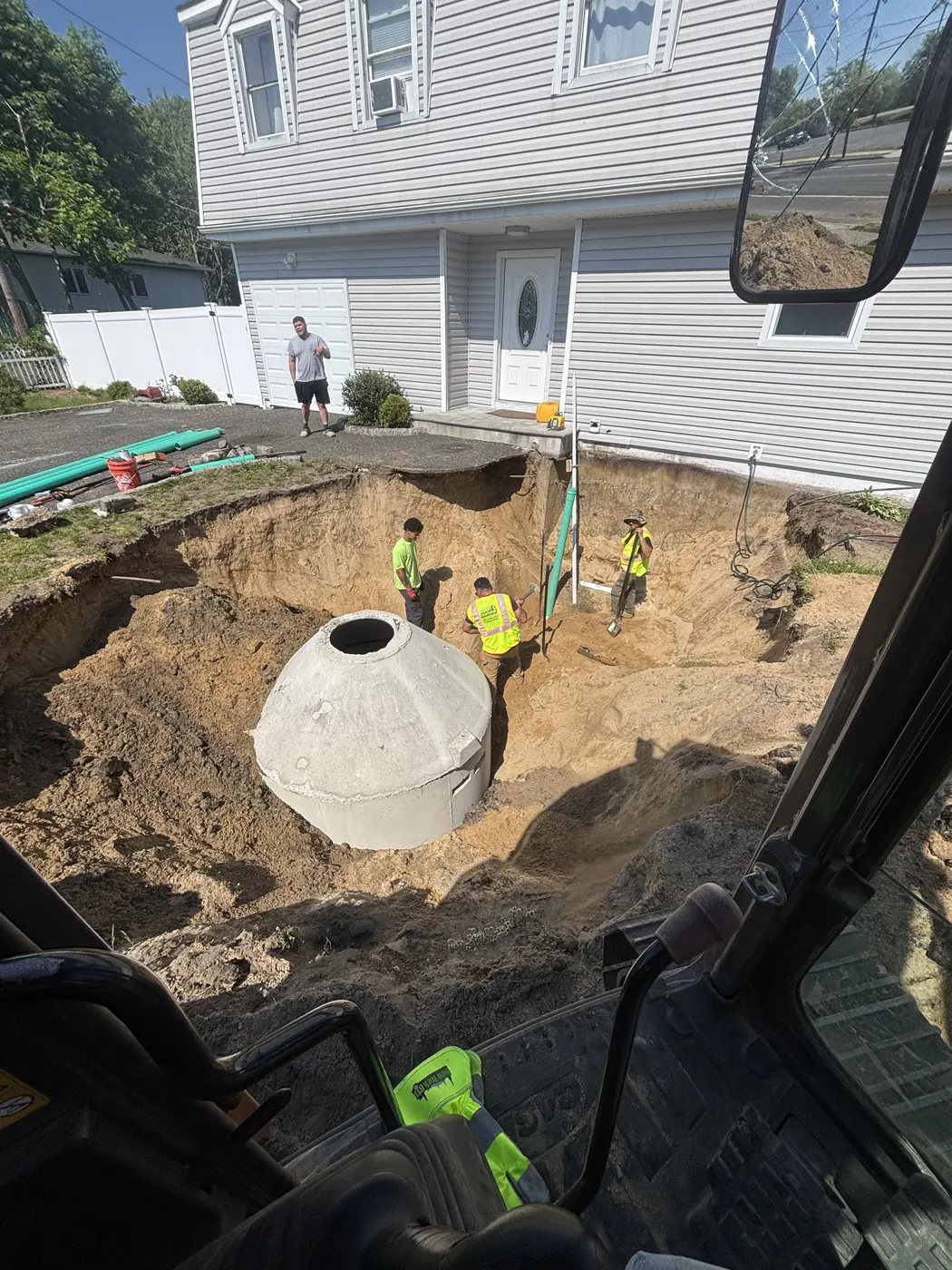 New construction cesspool installation — Rapid Response excavator on site